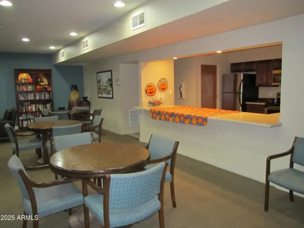 a view of a dining room with furniture