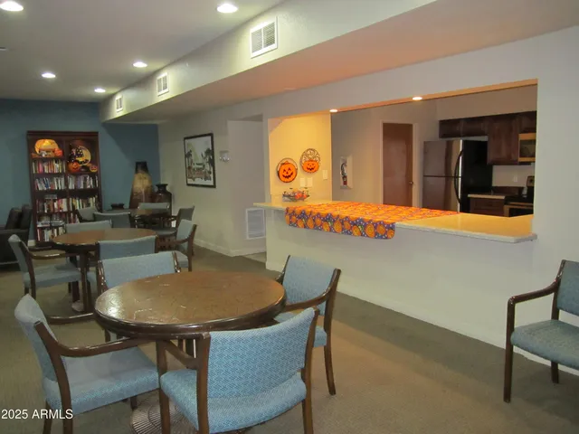 a view of a dining room with furniture