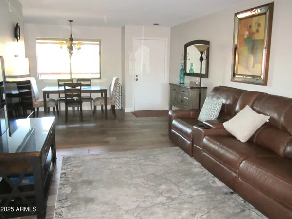 a living room with furniture and window