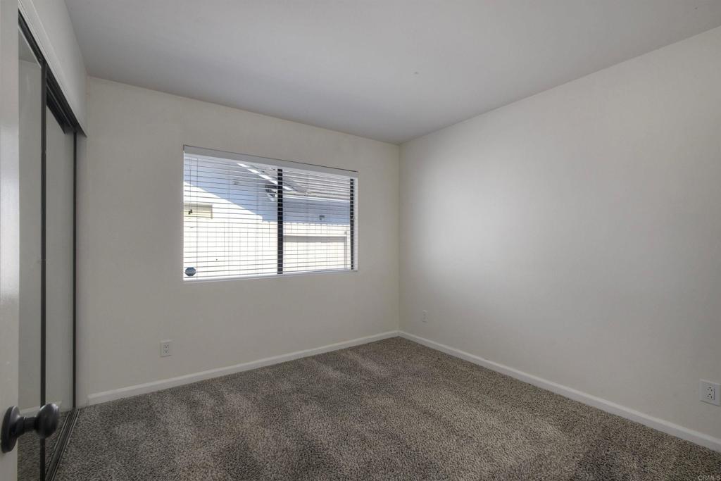 1394 Longfellow Road Vista, CA 92081 - Photo 23 of 50 an empty room with a window