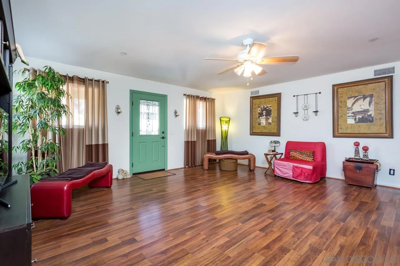 2341 Lake Morena Drive Campo, CA 91906 - Photo 26 of 45 a living room with furniture window and wooden floor