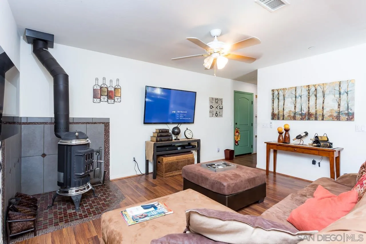 2341 Lake Morena Drive Campo, CA 91906 - Photo 30 of 45 a living room with furniture and a wooden floor