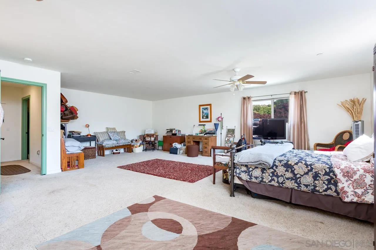 2341 Lake Morena Drive Campo, CA 91906 - Photo 3 of 45 a bedroom with furniture and a large window