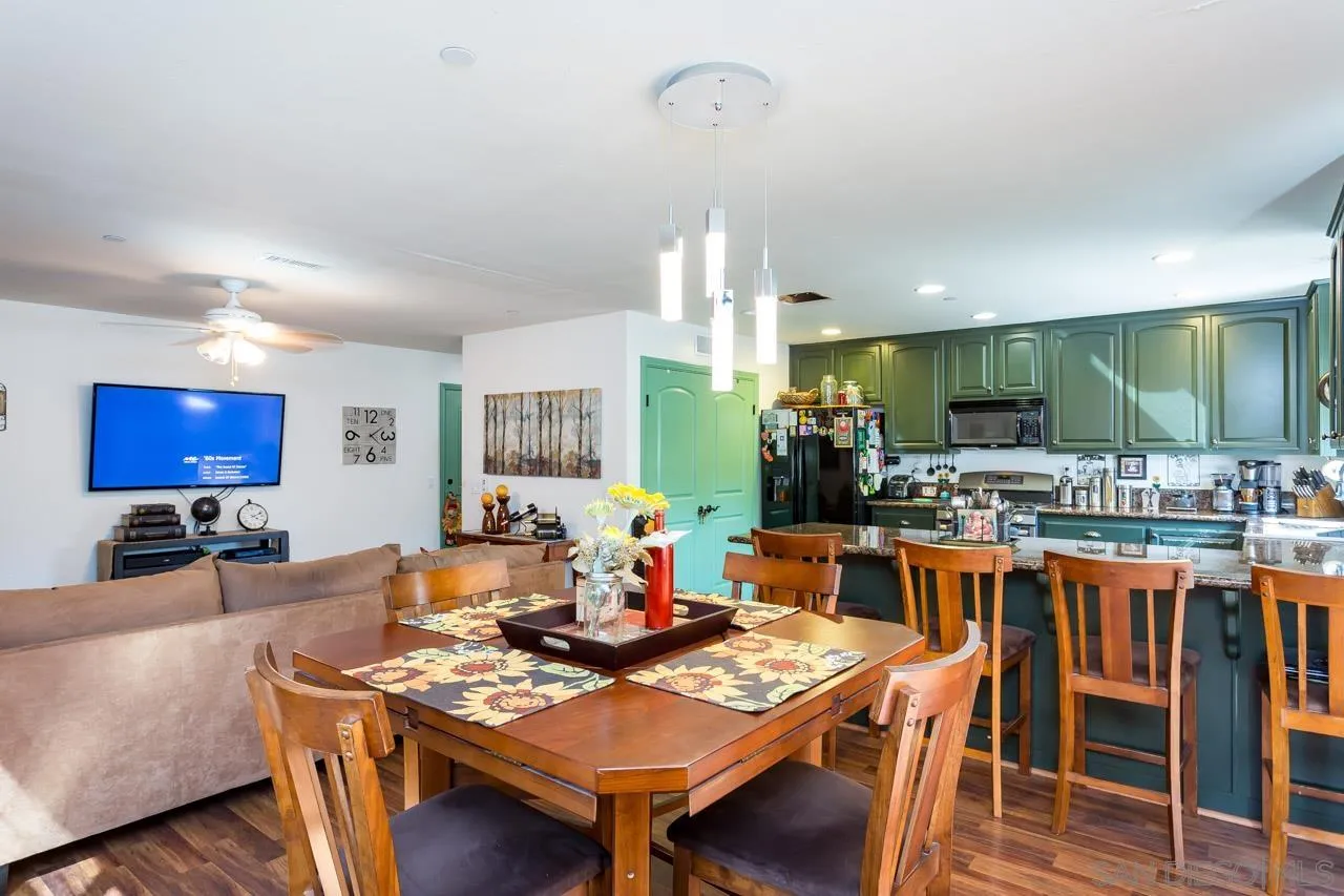 2341 Lake Morena Drive Campo, CA 91906 - Photo 35 of 45 a view of a dining room with furniture and wooden floor