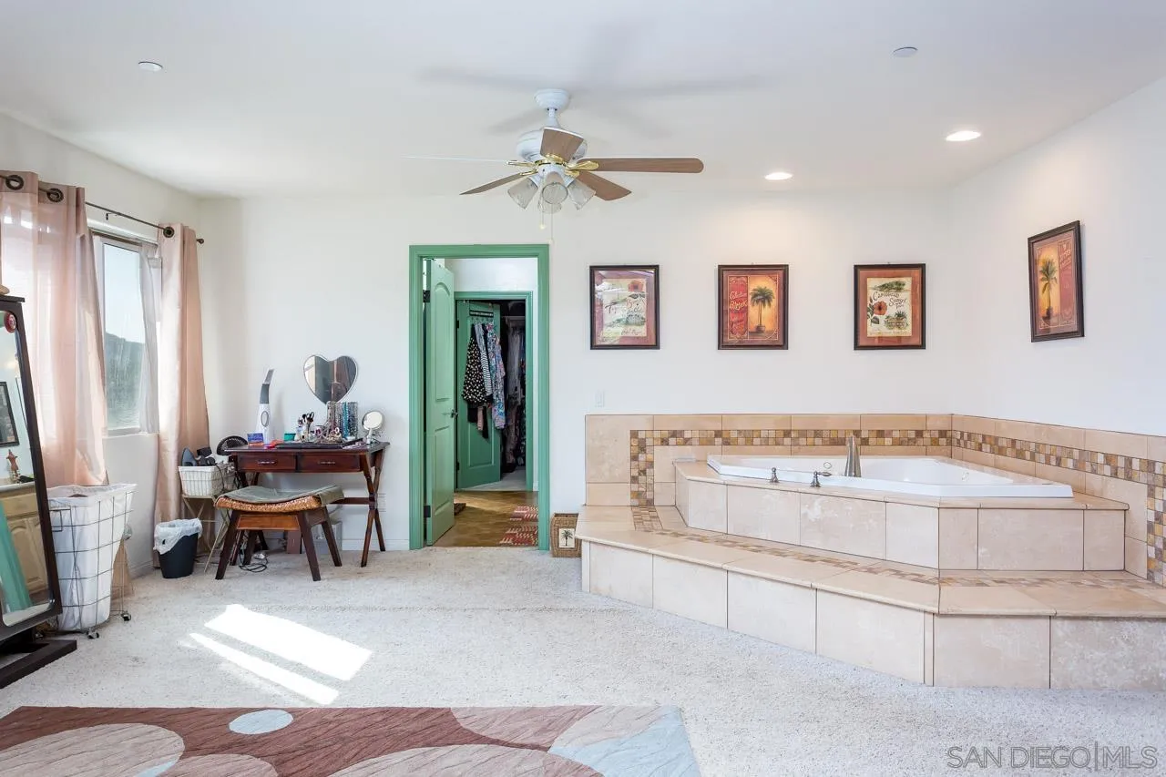 2341 Lake Morena Drive Campo, CA 91906 - Photo 5 of 45 a living room with furniture and a chandelier