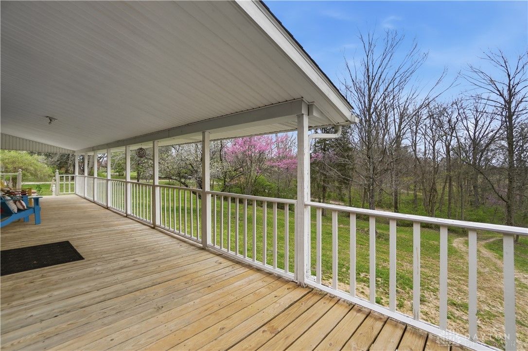 7553 Coffin Station Road Springfield, OH 45502 - Photo 89 of 95 Enjoy tranquil moments and scenic views from this expansive covered porch.