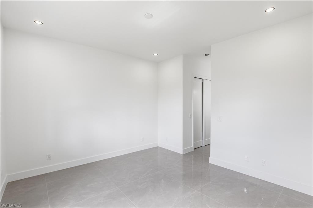 1122 Edelweiss Street East Lehigh Acres, FL 33974 - Photo 16 of 27 a view of an empty room