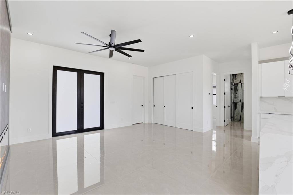1122 Edelweiss Street East Lehigh Acres, FL 33974 - Photo 9 of 27 a view of an empty room