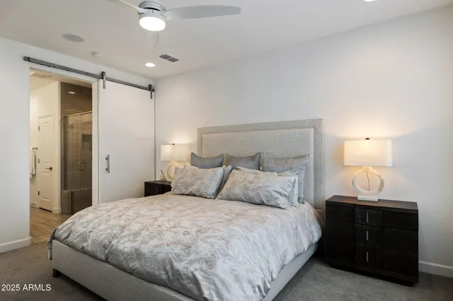 a bathroom with a toilet a sink and a shower