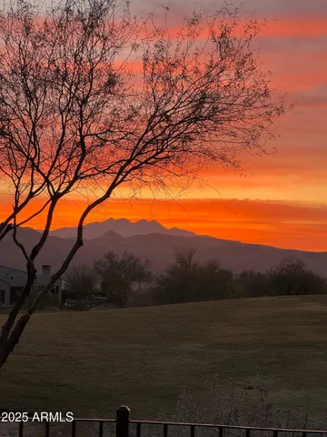 a view of a backyard of the house