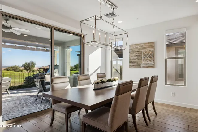 a bathroom with a double vanity sink a mirror and shower