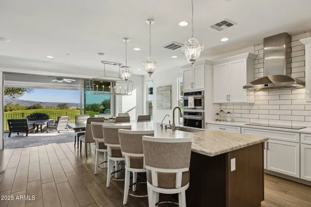 a bathroom with sink mirror and vanity