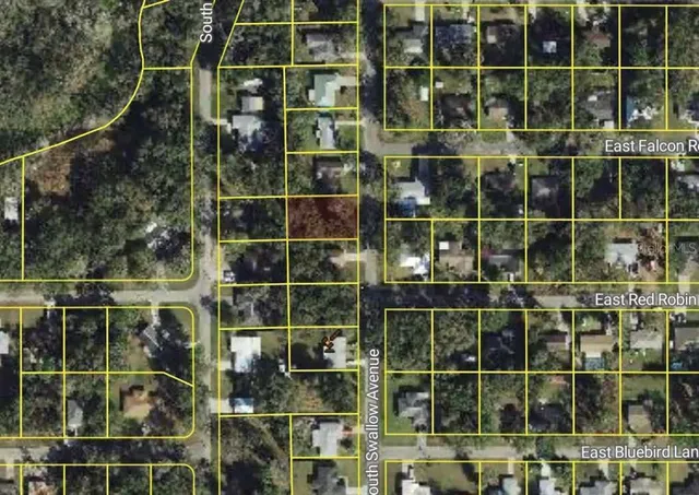 a view of a wooden deck with a large window