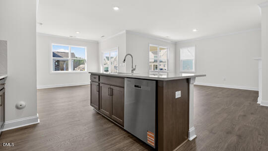 7580 Percussion Drive Apex, NC 27539 - Photo 11 of 44 a view of a kitchen counter space and windows
