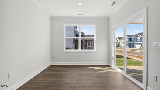 7580 Percussion Drive Apex, NC 27539 - Photo 16 of 44 a view of livingroom with furniture wooden floor and window