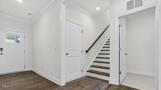 7580 Percussion Drive Apex, NC 27539 - Photo 21 of 44 a view of entryway with wooden floor