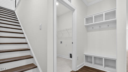 7580 Percussion Drive Apex, NC 27539 - Photo 22 of 44 a view of a hallway with wooden floor and entryway