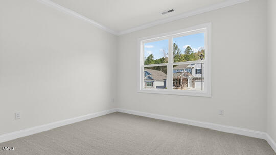 7580 Percussion Drive Apex, NC 27539 - Photo 25 of 44 an empty room with a window