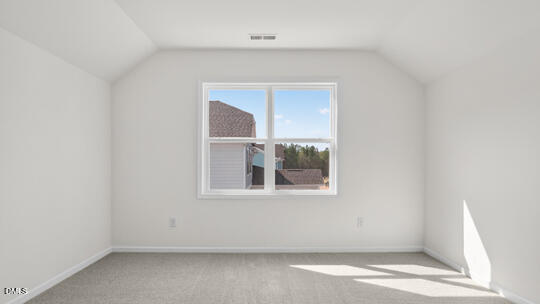 7580 Percussion Drive Apex, NC 27539 - Photo 31 of 44 an empty room with a window