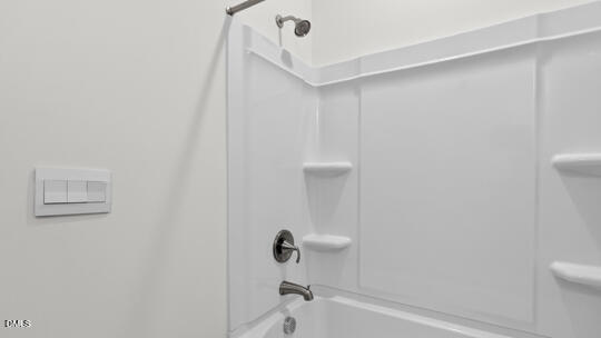 7580 Percussion Drive Apex, NC 27539 - Photo 37 of 44 a bathroom with a shower