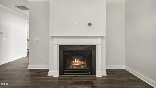 a living room with a fireplace