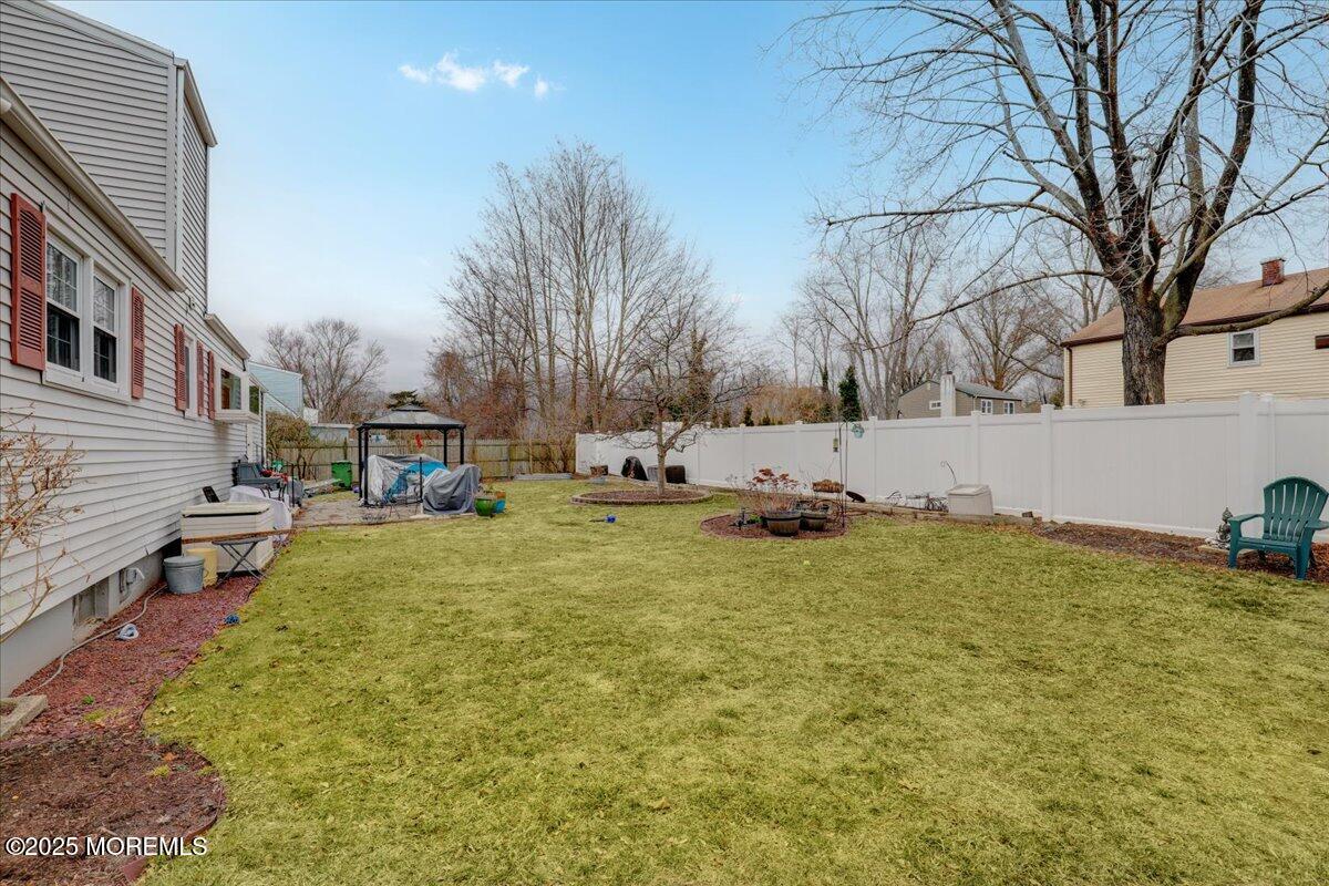 7 Rutgers Terrace Neptune Township, NJ 07753 - Photo 23 of 27 a view of yard with swimming pool and trees