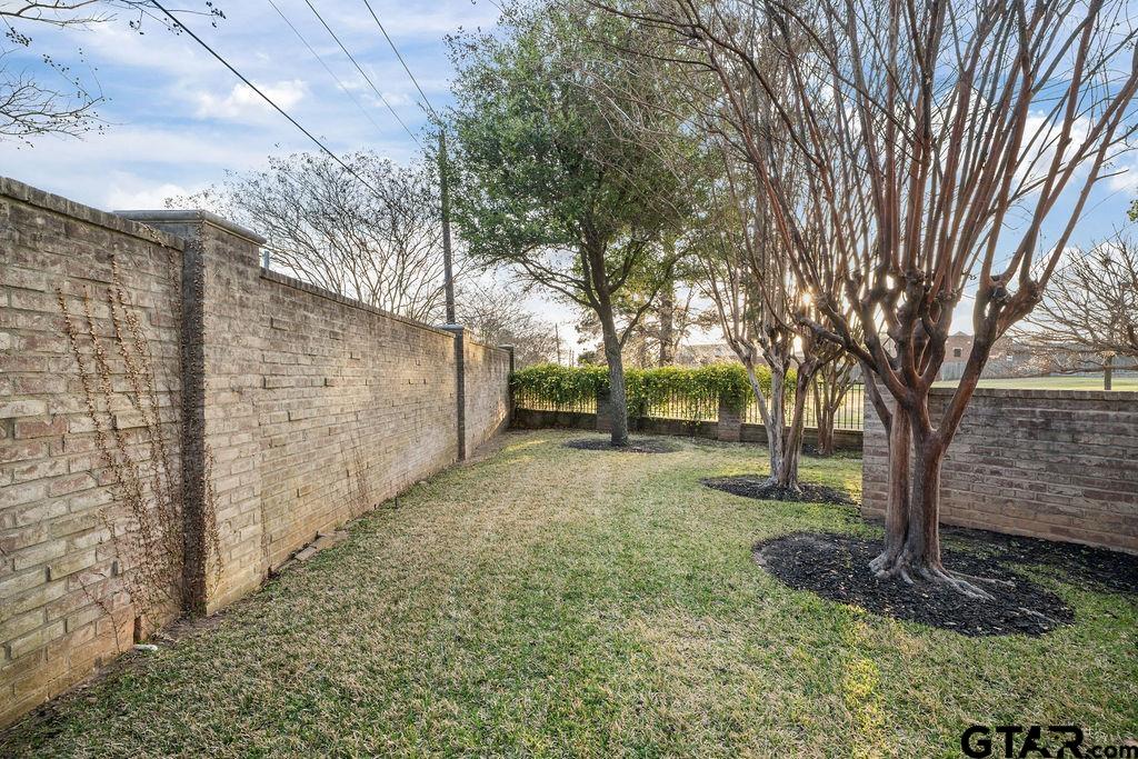 3048 Concord Place Tyler, TX 75701 - Photo 33 of 34 a view of a yard with a tree