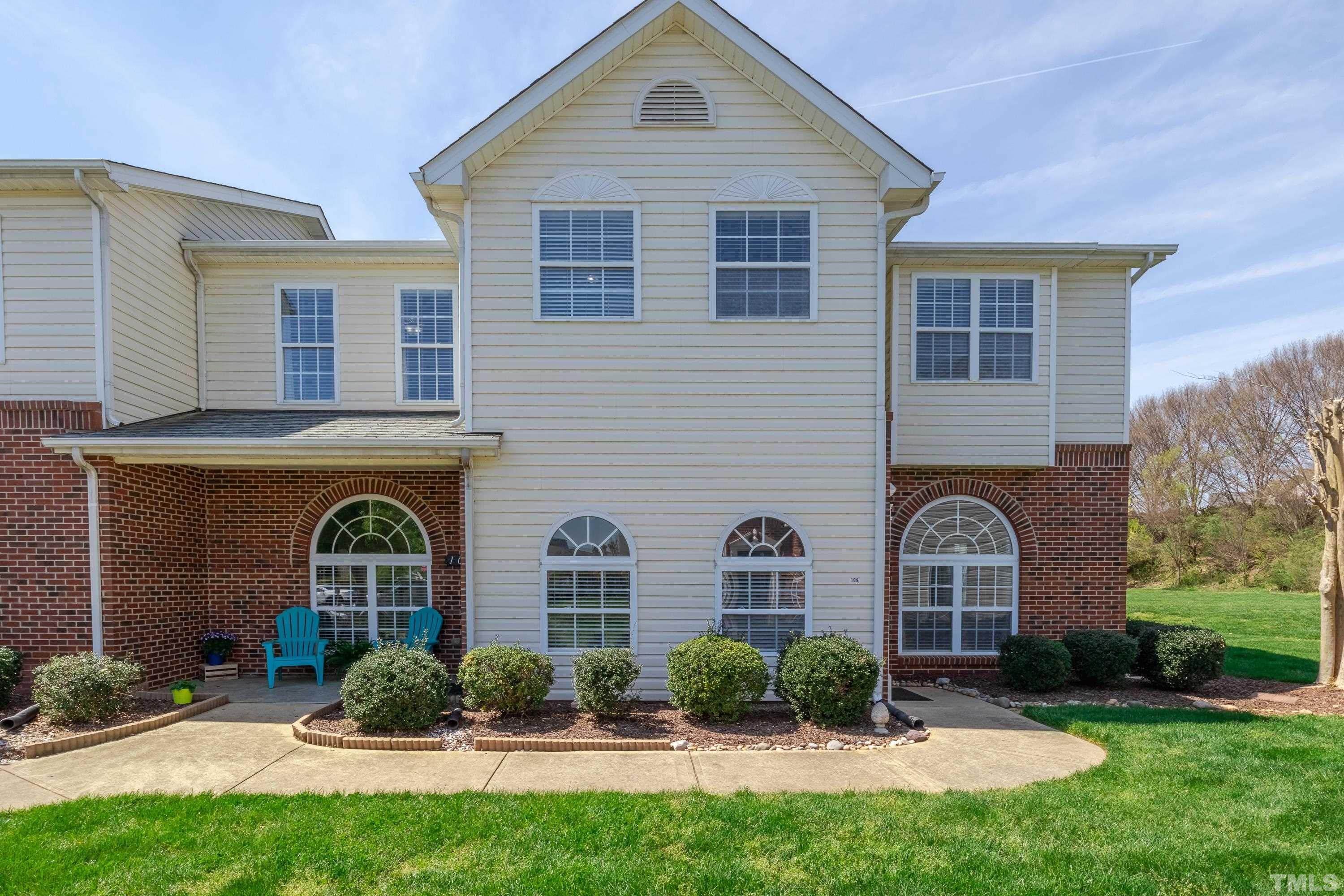 2101 Piney Brook Road, Unit 107 Raleigh, NC 27614 - Photo 1 of 37 a front view of a house with garden