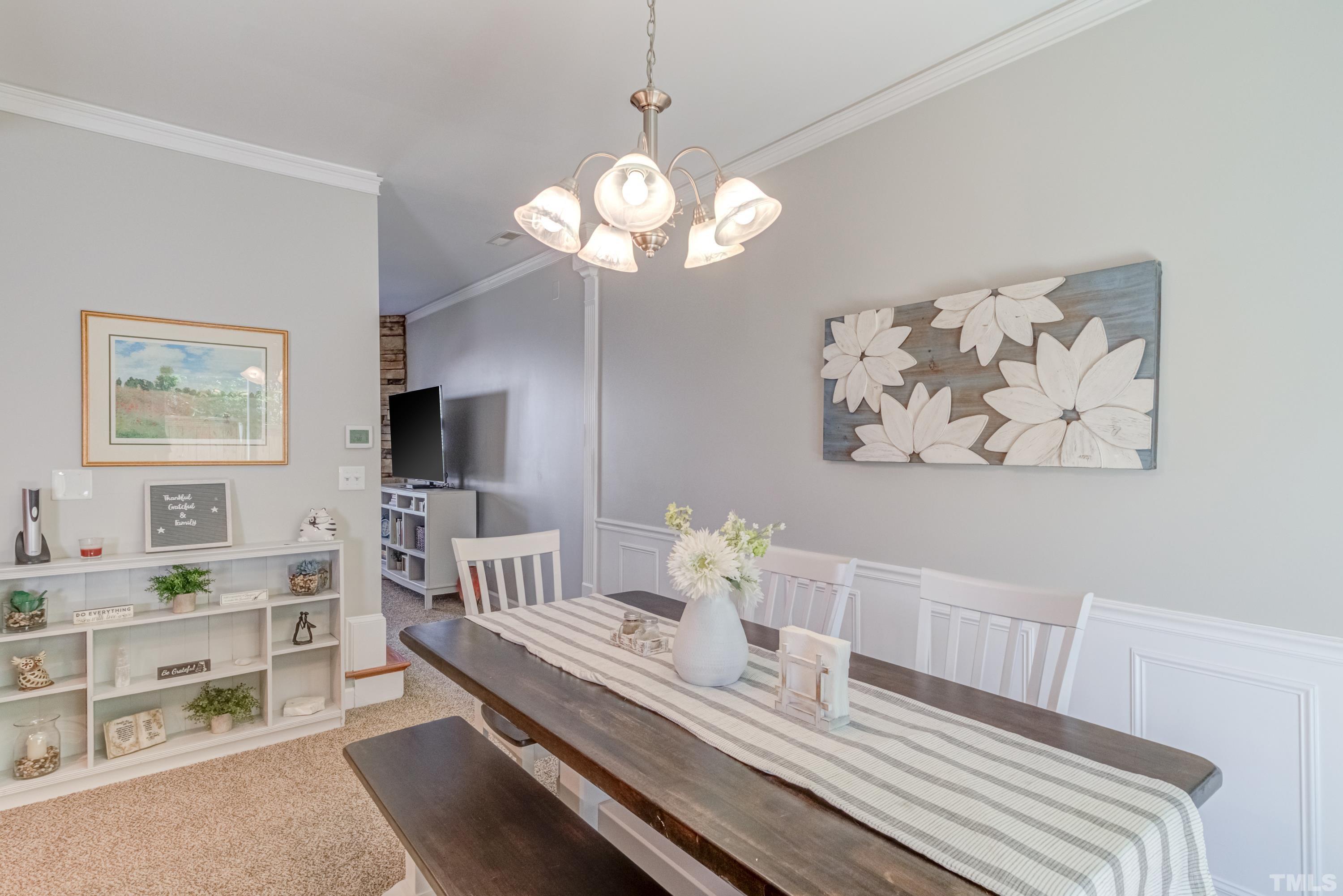 2101 Piney Brook Road, Unit 107 Raleigh, NC 27614 - Photo 11 of 37 a view of a dining room with furniture
