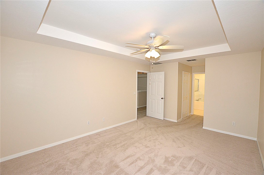 1210 Clearmont Street Sebastian, FL 32958 - Photo 14 of 31 an empty room with a ceiling fan and a window