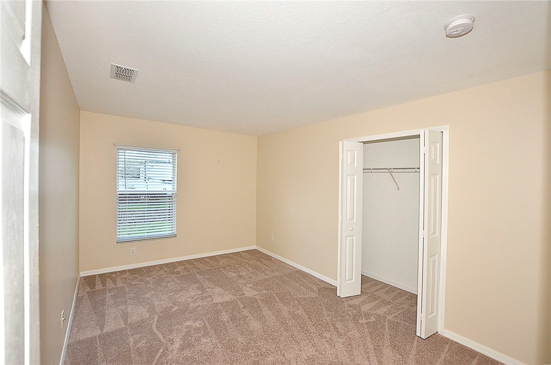 1210 Clearmont Street Sebastian, FL 32958 - Photo 22 of 31 a view of an empty room with a window