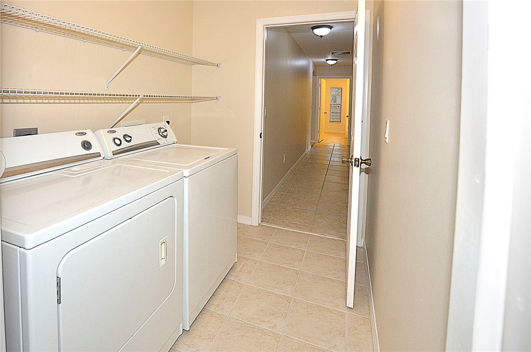 1210 Clearmont Street Sebastian, FL 32958 - Photo 24 of 31 a utility room with dryer and washer