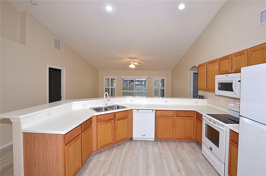 1210 Clearmont Street Sebastian, FL 32958 - Photo 8 of 31 a kitchen with a sink and cabinets
