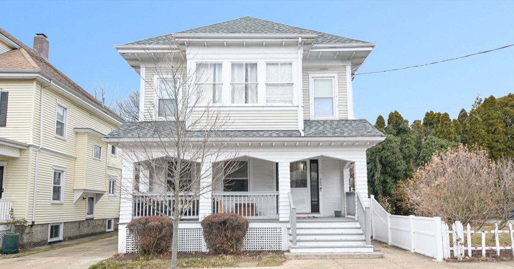 265 Maple Street New Bedford, MA 02740 - Photo 1 of 35 a front view of a house with large windows