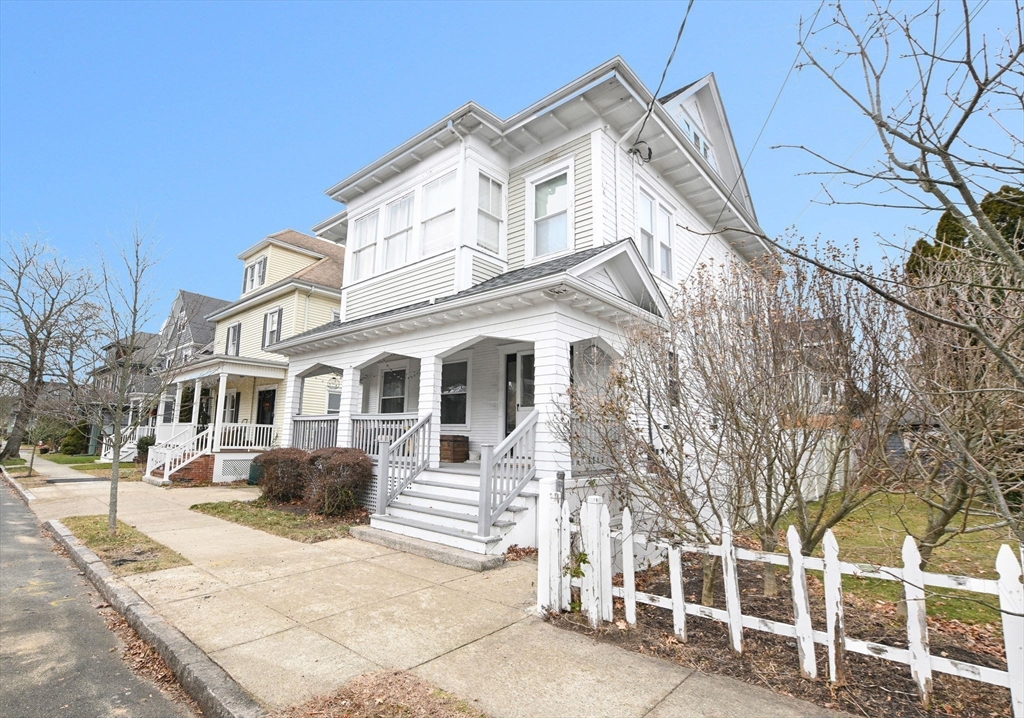 265 Maple Street New Bedford, MA 02740 - Photo 30 of 35 a front view of a house with a yard