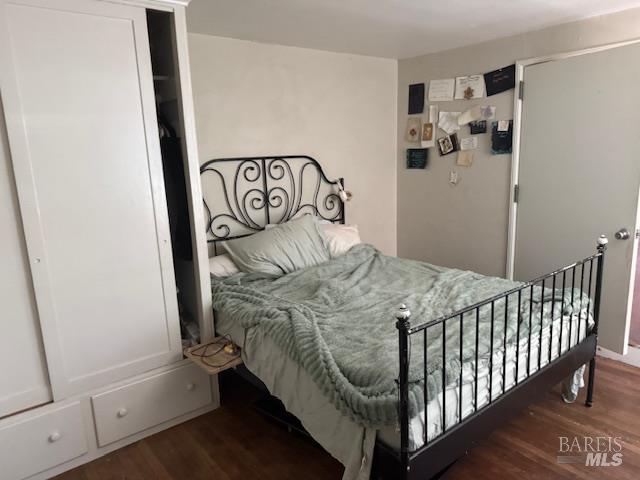 618 Benton Street Santa Rosa, CA 95404 - Photo 21 of 27 a bedroom with a bed and a window