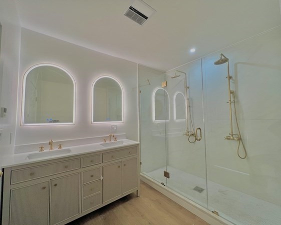 31 Carleton Street Attleboro, MA 02703 - Photo 6 of 14 a bathroom with a double vanity sink mirror and double