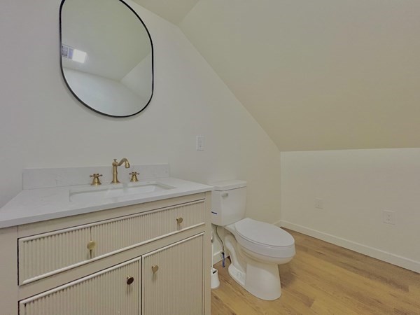 31 Carleton Street Attleboro, MA 02703 - Photo 10 of 14 a bathroom with a sink and a mirror