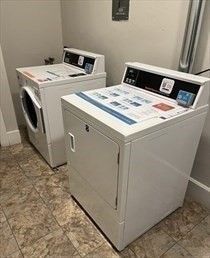 362 Commonwealth Avenue, Unit 2H Boston, MA 02115 - Photo 14 of 20 a utility room with dryer and washer