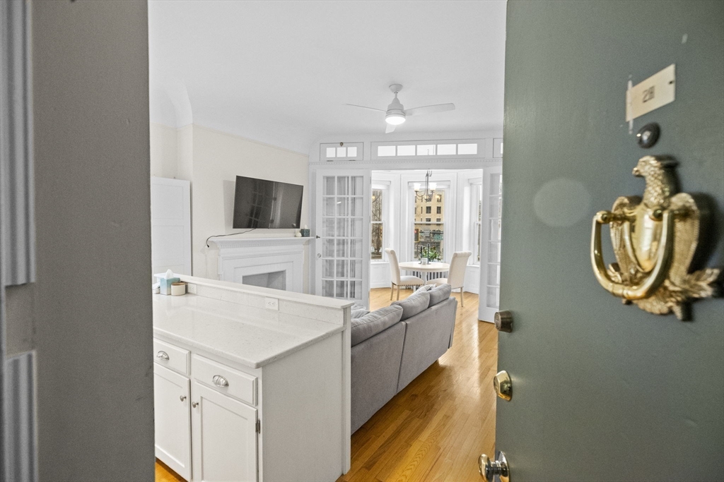 362 Commonwealth Avenue, Unit 2H Boston, MA 02115 - Photo 3 of 20 a view of living room with furniture and flat screen tv