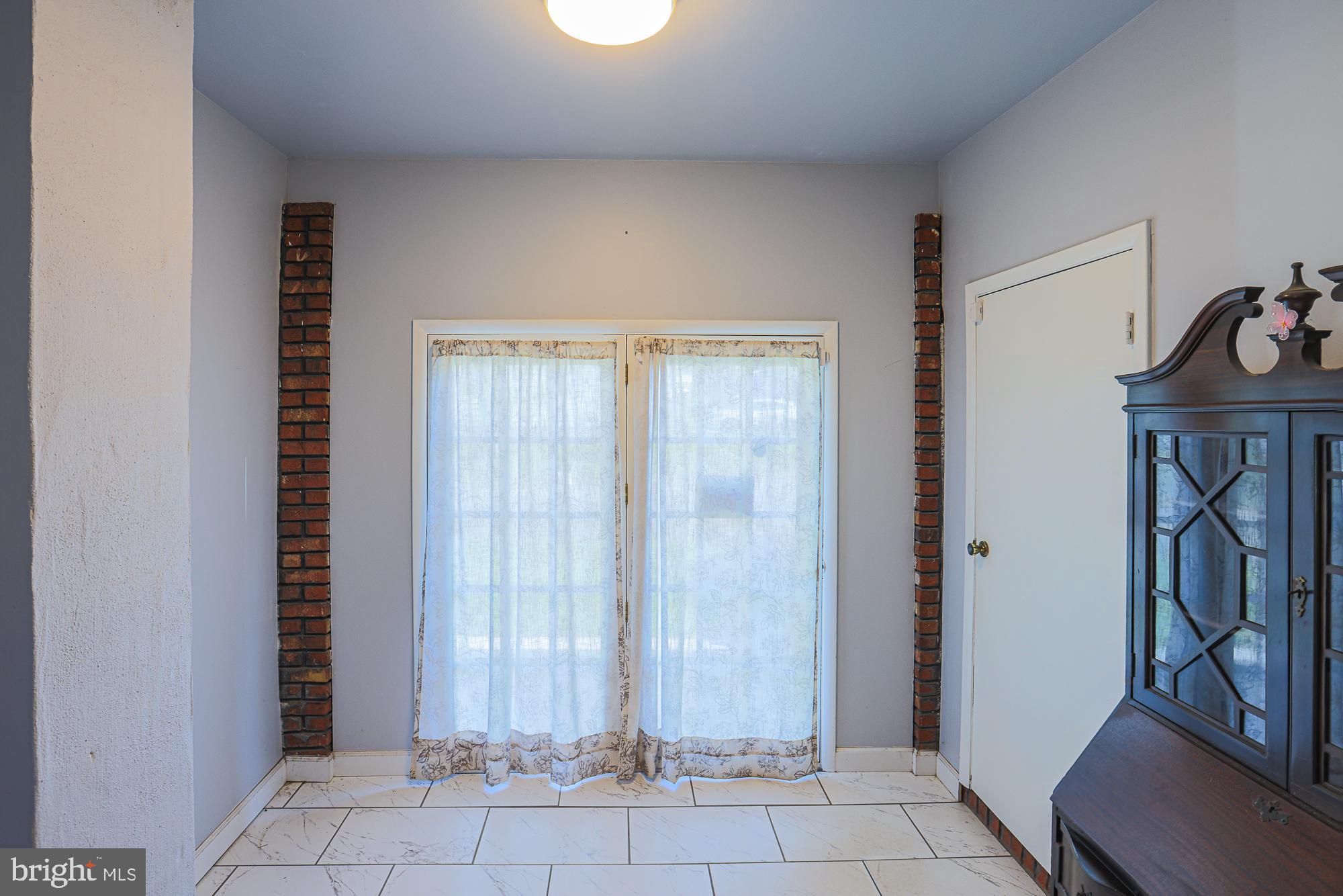 7933 34th Street Rosedale, MD 21237 - Photo 15 of 32 a view of entryway with livingroom