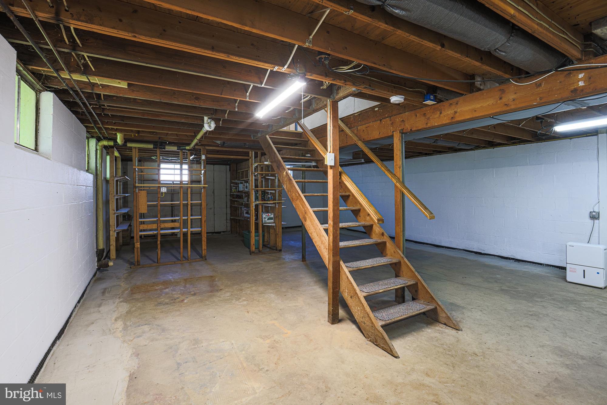 7933 34th Street Rosedale, MD 21237 - Photo 20 of 32 a view of an empty room with stairs