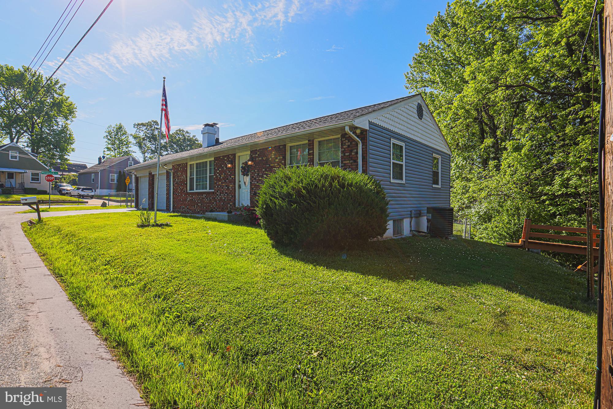 7933 34th Street Rosedale, MD 21237 - Photo 3 of 32 a front view of house with yard and green space
