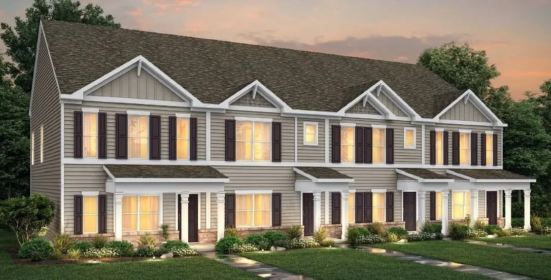 front view of a house with a yard