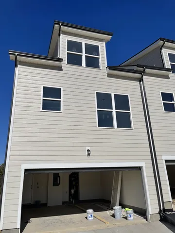 a front view of house with stairs
