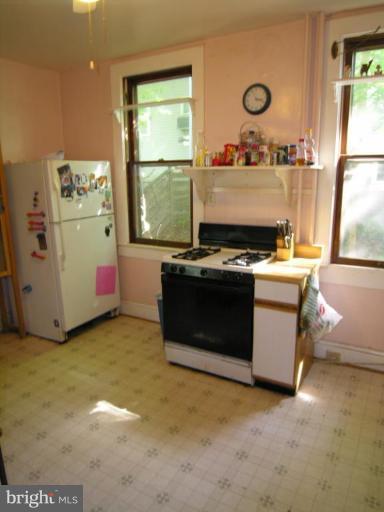 5007 Morello Road Baltimore, MD 21214 - Photo 11 of 28 a room with storage and utility
