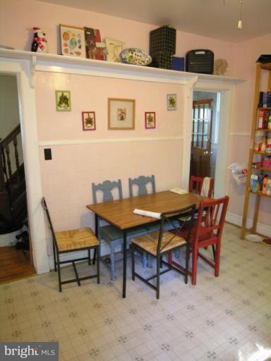 5007 Morello Road Baltimore, MD 21214 - Photo 12 of 28 a living room with furniture and a table