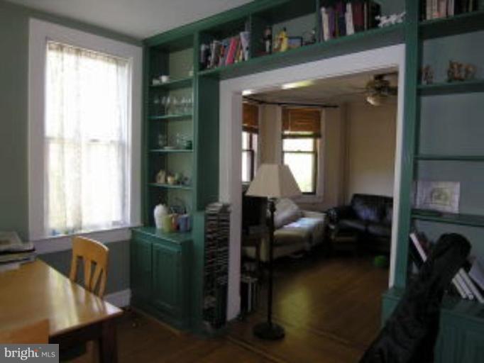 5007 Morello Road Baltimore, MD 21214 - Photo 16 of 28 a living room with furniture and a window