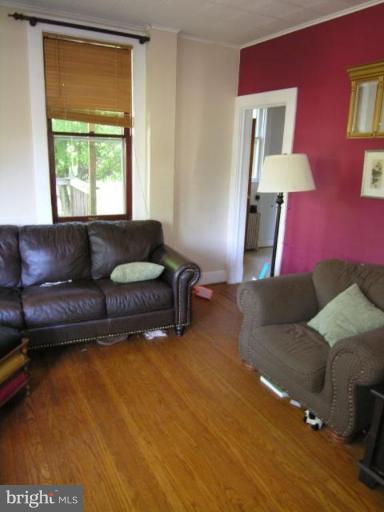 5007 Morello Road Baltimore, MD 21214 - Photo 20 of 28 a living room with furniture and a window