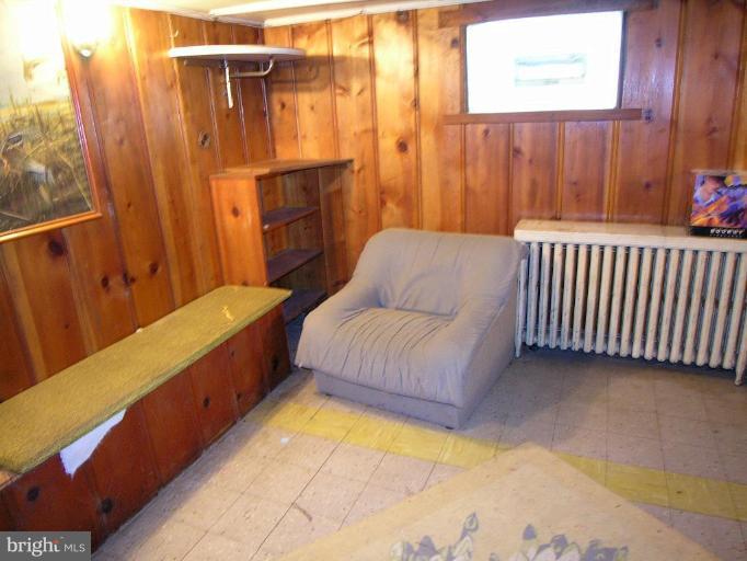 5007 Morello Road Baltimore, MD 21214 - Photo 28 of 28 a bedroom with furniture and a window
